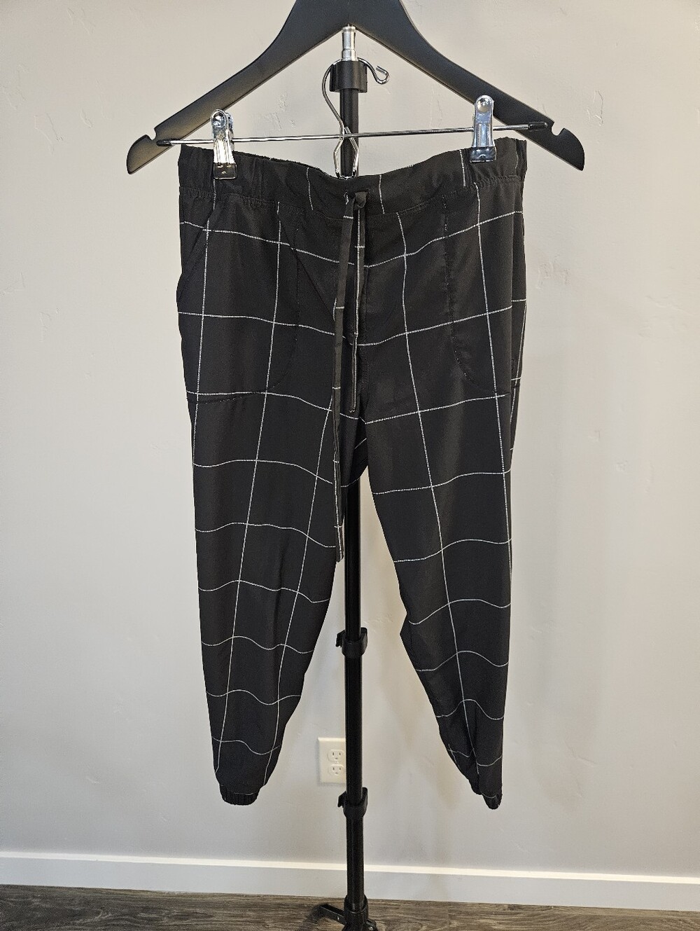 Albion Fit Destination Joggers in a black windowpane plaid pattern